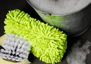 a bucket of soapy water for hand washing