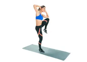Standing side crunch exercise